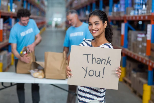 Woman holding sign board with thank you message — Stock Photo, Image