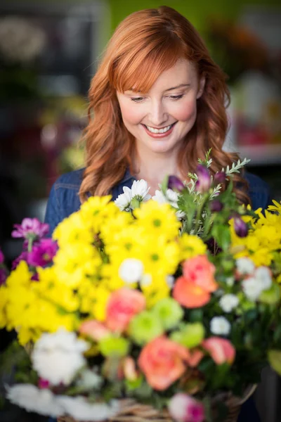 Florist standing and smiling Royalty Free Stock Images