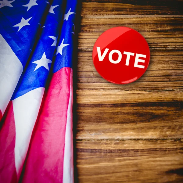 Political button against usa flag — Stock Photo, Image