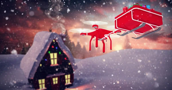 Drone pulling chirstmas sledge — стоковое фото