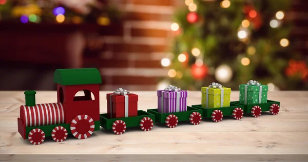 Train model carrying gift boxes — Stock Photo, Image