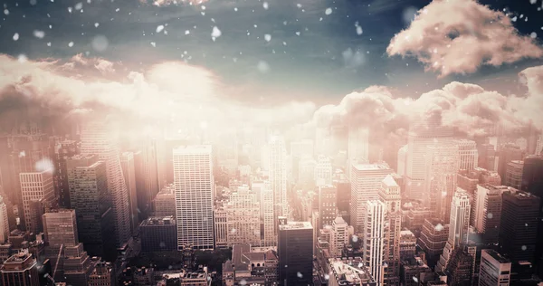 Snow falling against aerial view of city — Stock Photo, Image