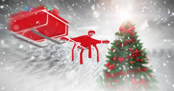 Drone pulling chirstmas sledge — стоковое фото