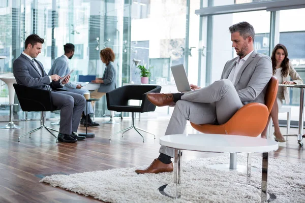 Businessman working on laptop — Stock Photo, Image