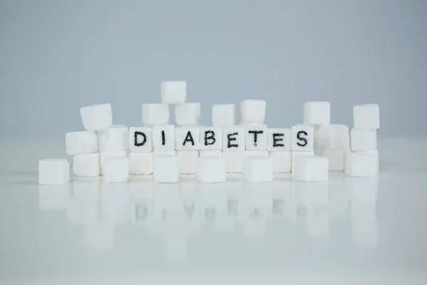 Zucchero cubetti ortografia diabete — Foto Stock