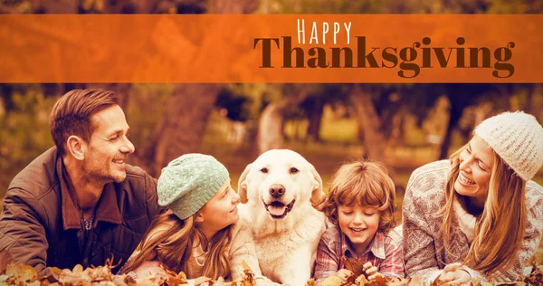 Happy thanksgiving text with smiling family — Stock Photo, Image