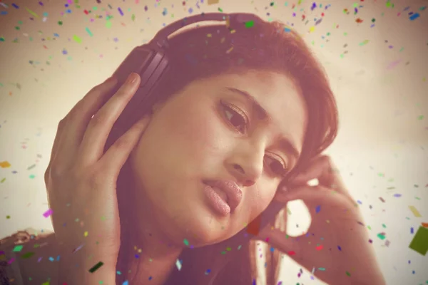 Pretty female dj listening music — Stock Photo, Image