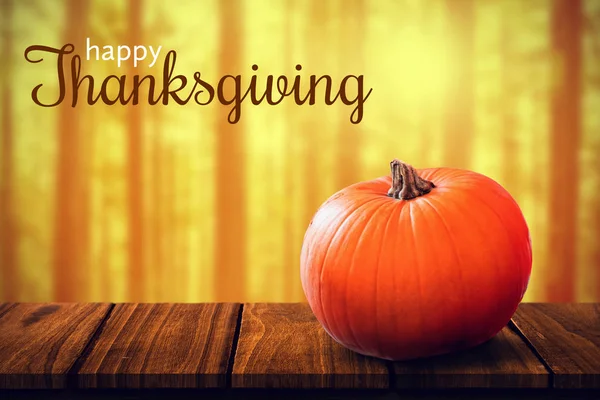 Thanksgiving greeting against pumpkin — Stock Photo, Image