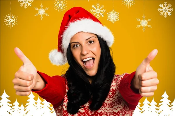 Donna in cappello di Babbo Natale dando pollici in su — Foto Stock