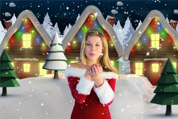 Woman in santa costume blowing kiss — Stock Photo, Image