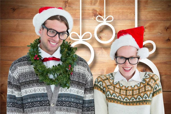 Paar in santa hat en winter slijtage — Stockfoto