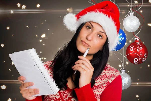 Thoughtful woman in santa hat — Stock Photo, Image