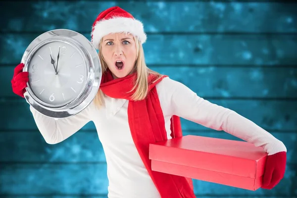 Anxious woman in santa hat — Stock Photo, Image