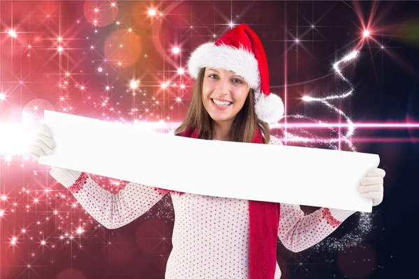 Kobieta w santa hat trzymając transparent — Zdjęcie stockowe