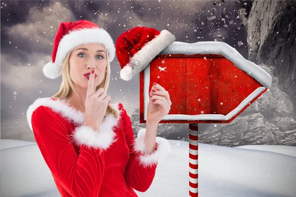 Dudaklarında parmak ile kadın Noel Baba — Stok fotoğraf