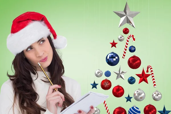 Thoughtful woman in santa hat — Stock Photo, Image