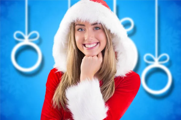 Frau im Weihnachtsmannkostüm mit Hand am Kinn — Stockfoto