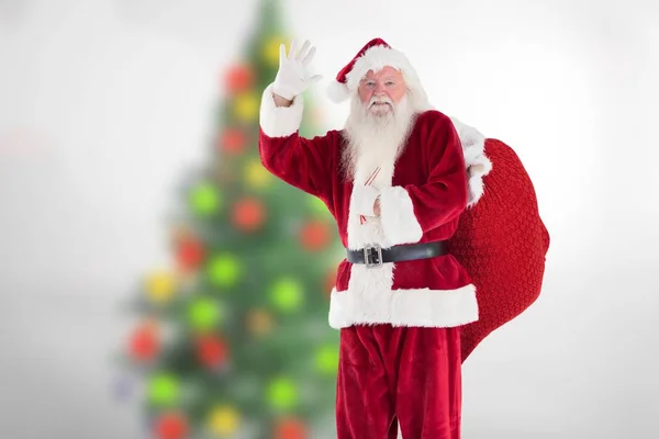 Noel Baba elini sallayarak — Stok fotoğraf