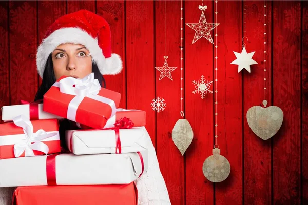 Shocked woman in santa hat — Stock Photo, Image