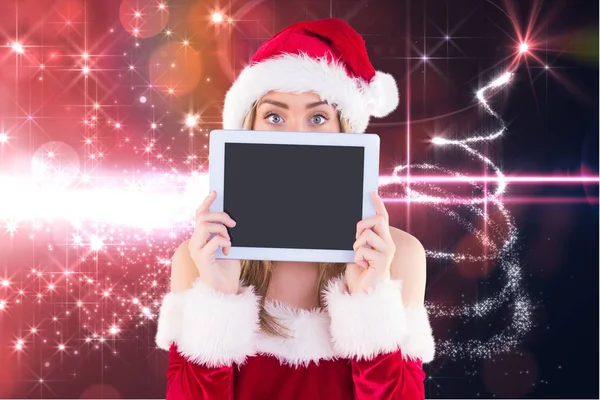 Vrouw in santa kostuum houden van Tablet PC — Stockfoto