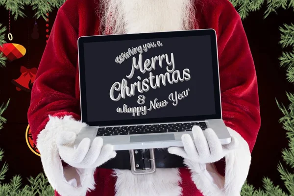 Santa Claus zobrazeno laptop — Stock fotografie