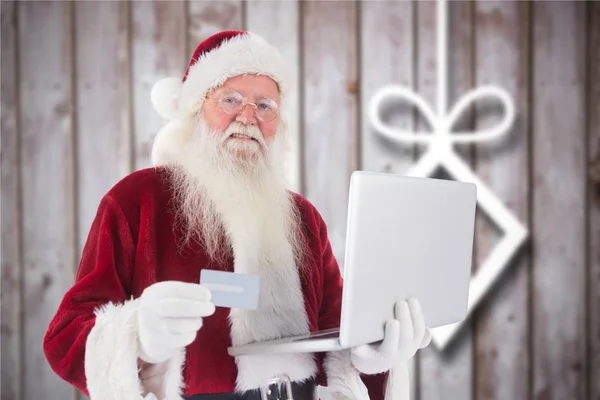 Santa claus doing online shopping — Stock Photo, Image