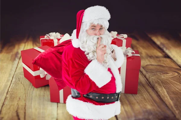 Papá Noel con dedo en los labios — Foto de Stock