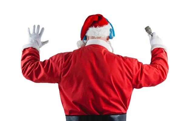 Santa claus listening to music — Stock Photo, Image