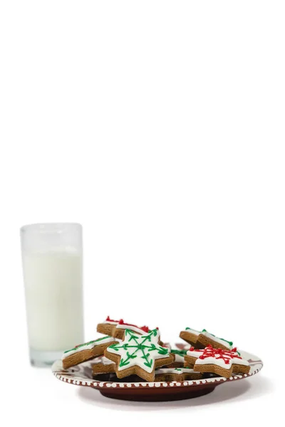 Mjölk och söt mat i plattan — Stockfoto