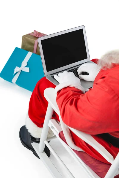 ซานตาคลอสใช้แล็ปท็อป — ภาพถ่ายสต็อก