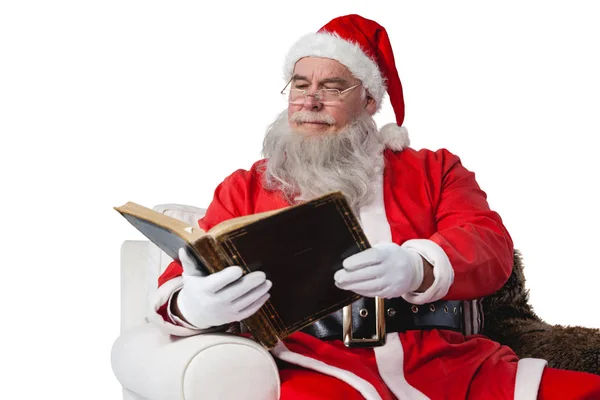 Weihnachtsmann liest Bibel — Stockfoto