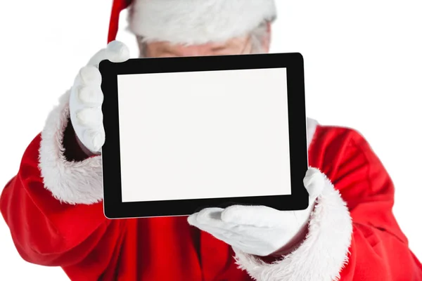 Weihnachtsmann zeigt digitales Tablet — Stockfoto