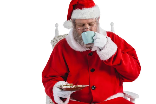 Kerstman met een kopje koffie — Stockfoto