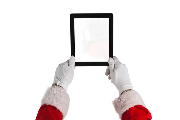 Santa Claus sosteniendo tableta digital — Foto de Stock