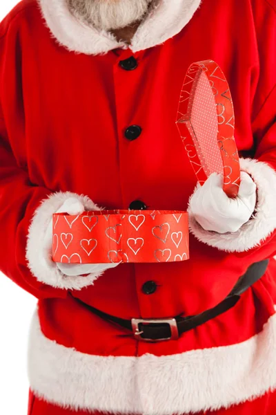 Santa claus opening a gift box — Stock Photo, Image