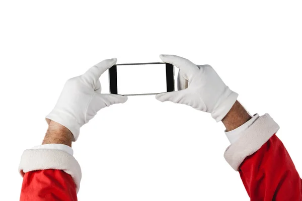 Santa claus gospodarstwa telefon komórkowy — Zdjęcie stockowe