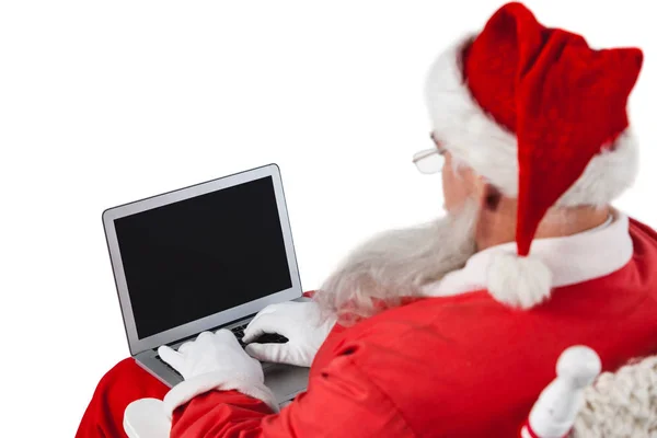 Santa claus pomocí přenosného počítače — Stock fotografie