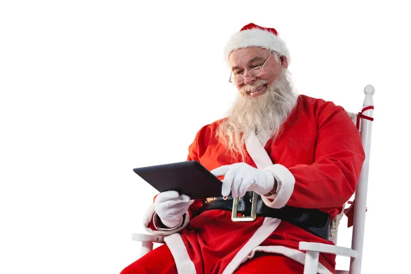 Weihnachtsmann mit digitalem Tablet — Stockfoto