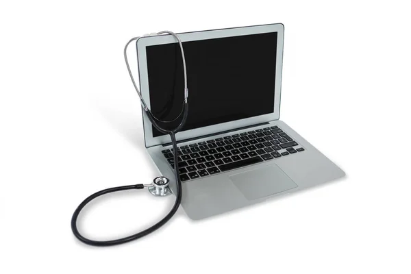 Close-up of stethoscope on laptop Royalty Free Stock Photos