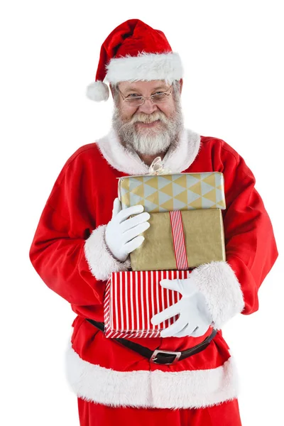 Santa claus segurando um presentes — Fotografia de Stock