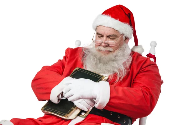 Santa claus bedrijf Bijbel — Stockfoto