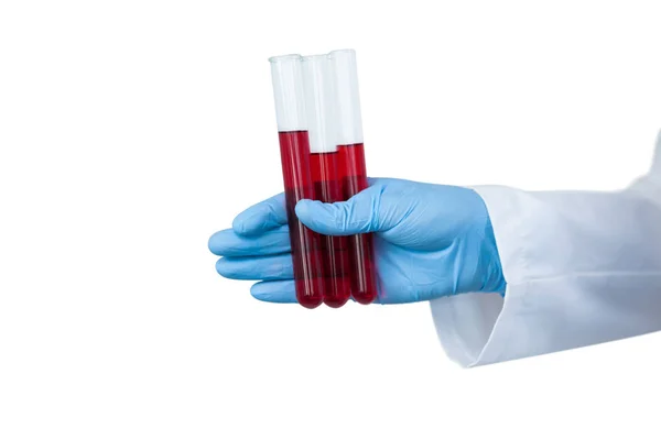 Hand of female scientist holding test tubes — Stock Photo, Image