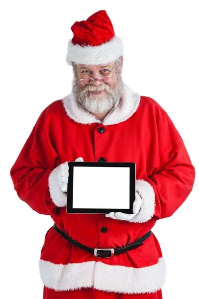 Weihnachtsmann zeigt digitales Tablet — Stockfoto