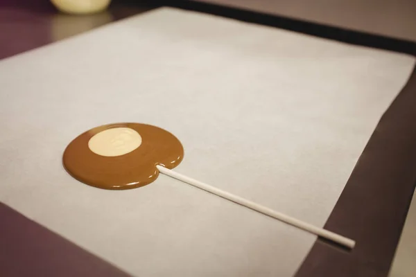 Lollipop drying on wax paper — Stock Photo, Image