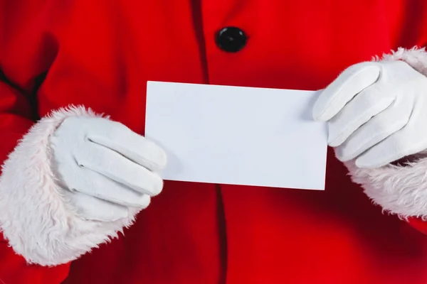 Santa claus tenant une plaque blanche — Photo