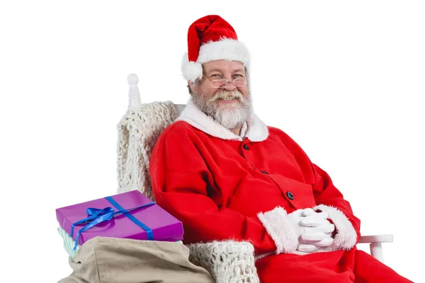 Santa Claus sitter på stol — Stockfoto