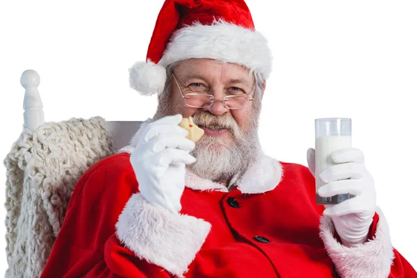 Santa claus po mleko i ciasteczka — Zdjęcie stockowe