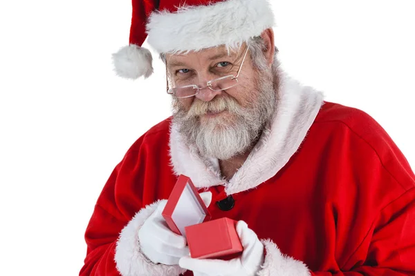 Babbo Natale apre una confezione regalo — Foto Stock