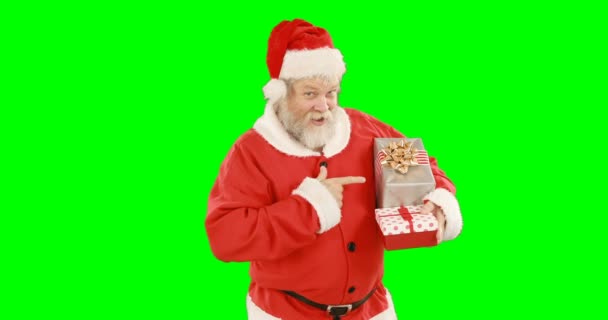 Babbo Natale in possesso di una scatola regalo — Video Stock