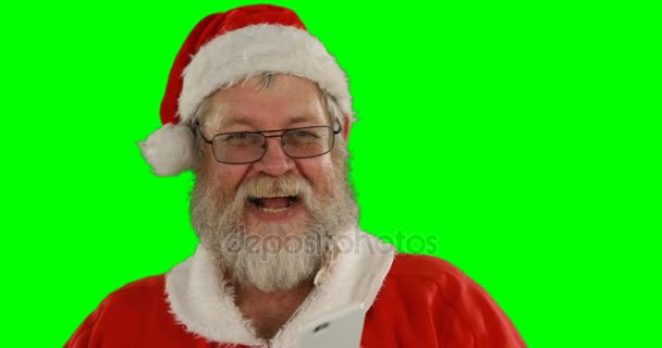 Санта Клаус показує мобільний телефон — стокове відео